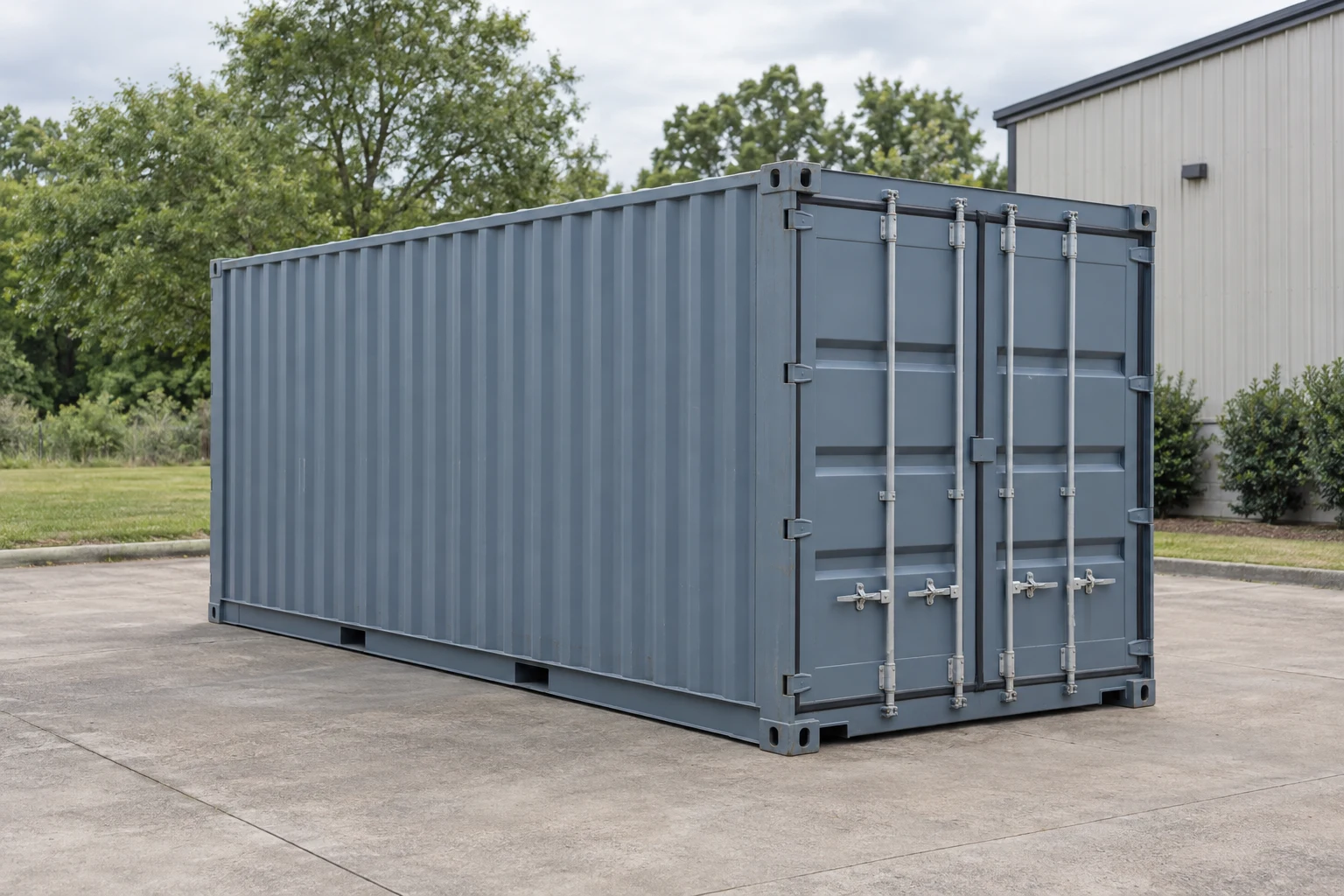 Photorealistic illustration of one clean 20ft shipping container on a prepared commercial pad in a fictional setting inspired by Baton Rouge, Louisiana.